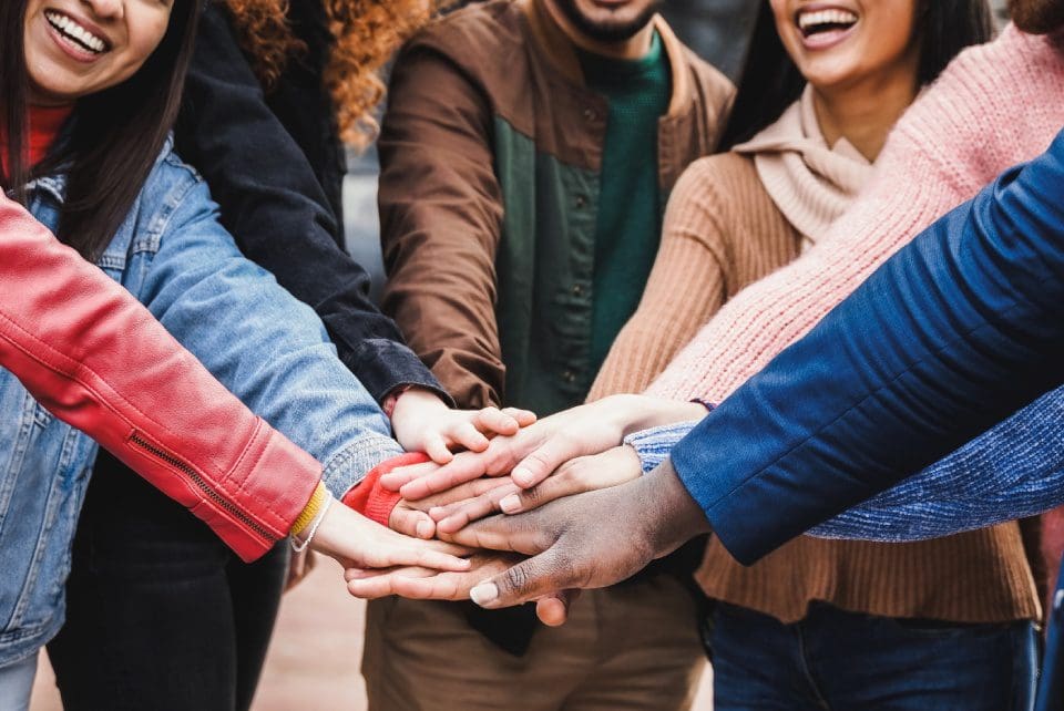 A group of people standing next to each other.